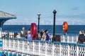 Llandudno , Wales - April 23 2018 : Folks enjoying the Pier at the seaside resort of Llandudno, North Wales, United Royalty Free Stock Photo