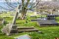 Llandudno , Wales, UK - April 22 2018 : Dramatic graves standing at St Tudno`s church and cemetery on the Great Orme at