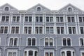 LLandudno, Wales, UK - MAY 27, 2018Old building with many windows on four floors. Frog perspective on the old looking building wit