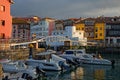 Port of fishing and pleasure, harbor of Llanes at sunset