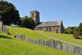 Llanfair St Mary`s Church and gravestones in the summer sunshine