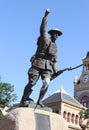 Llano, TX - June 8, 2023: World War 1 Monument and Historic Llano County Courthouse in Llano TX