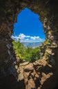 LLansteffan beach seen through hole of castle walls