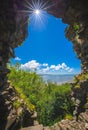 LLansteffan beach seen through hole of castle walls