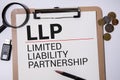 LLC - Limited Liability Company acronym on notepad, Business concept background. Royalty Free Stock Photo