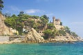 Lloret de Mar Castle on beach. Castell Platja at Sa Caleta beach in costa Brava of Catalonia Spain. Mediterranean sea