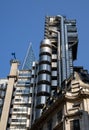 he Lloyds building with the pointed spire of The Scalpel behind in London, UK