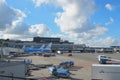 LM plane being loaded at Schiphol Airport