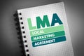 LMA - Local Marketing Agreement acronym on notepad, business concept background