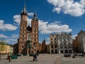 Lmost empty Main Square in Krakow during coronavirus covid-19 pandemic. View over Mariacki Church