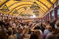 LMUNICH, GERMANY - 25 SEPTEMBER 2014:People drinking in the Beer Tent, The Oktoberfest is the biggest beer festival