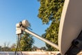 LNB, Satellite Dish over the blue sky in background Royalty Free Stock Photo