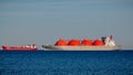 LNG (Liquified Natural Gas) tanker and tanker anchored and waited near port. Royalty Free Stock Photo