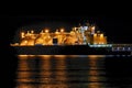 LNG tanker in port at night. Gas carrier at the GAS terminal. Royalty Free Stock Photo