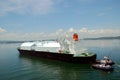 LNG tanker ship transiting through Panama Canal. Royalty Free Stock Photo