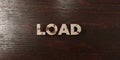Load - grungy wooden headline on Maple - 3D rendered royalty free stock image