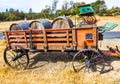 Load Of Old Wooden Wine Barrels In Vintage Wagon