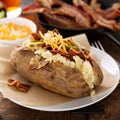 Loaded baked potato with bacon and cheese