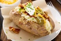 Loaded baked potato with bacon and cheese Royalty Free Stock Photo