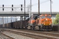 Loaded BNSF coal train passes northbound through downtown Seattle