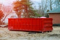 Loaded dumpster near a construction site, home renovation Royalty Free Stock Photo