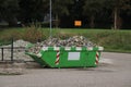 Loaded dumpster near a construction site Royalty Free Stock Photo