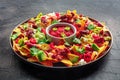 Loaded nachos. Mexican nacho chips with beef and avocado Royalty Free Stock Photo