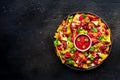 Loaded nachos. Mexican nacho chips with beef, overhead flat lay shot Royalty Free Stock Photo