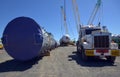 Loaded onto huge multi wheeled heavy haulage trucks are these huge refinery storage vessels.