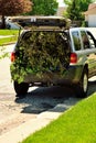 Branched loaded into an SUV take to drop off station Royalty Free Stock Photo