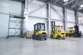 Loader in modern storehouse Royalty Free Stock Photo