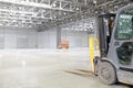 Loader in modern storehouse Royalty Free Stock Photo
