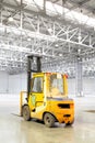 Loader in modern storehouse Royalty Free Stock Photo