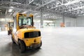 Loader in modern storehouse Royalty Free Stock Photo