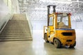 Loader in modern storehouse Royalty Free Stock Photo