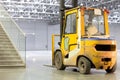 Loader in modern storehouse Royalty Free Stock Photo