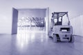 Loader in modern storehouse Royalty Free Stock Photo