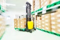 Loader stacker at warehouse