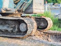 Loader in work laying tubes.