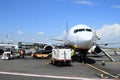 Loading airplane on airport Royalty Free Stock Photo