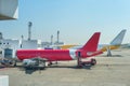 Loading airplanes at airport runway