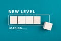 Loading bar with the words new level, education and business concept, progress in a game, step up for a different challenge