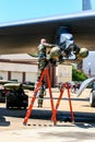 Loading bombs on B-52 bomber