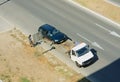 Loading broken car on a tow truck on a roadside Royalty Free Stock Photo