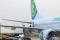 Workers are loading cargo in a Dutch Transavia plane,Eindhoven airport, Netherlands Royalty Free Stock Photo