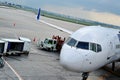 Loading cargo on a plane Royalty Free Stock Photo