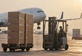 Loading cargo on plane in airport Royalty Free Stock Photo