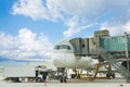 Loading cargo on plane in airport. cargo plane loading for logistic and transport. view through window Passenger terminal Royalty Free Stock Photo