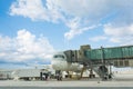 Loading cargo on plane in airport. cargo plane loading for logistic and transport. view through window Passenger terminal Royalty Free Stock Photo