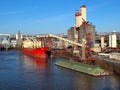 Loading a cargo ship, grain elevators Portland OR. Royalty Free Stock Photo